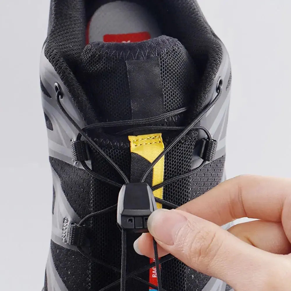 Dark grey quick lace kit with no-tie round shoelaces for Salomon running sneakers, designed for easy, secure fit and creative style.