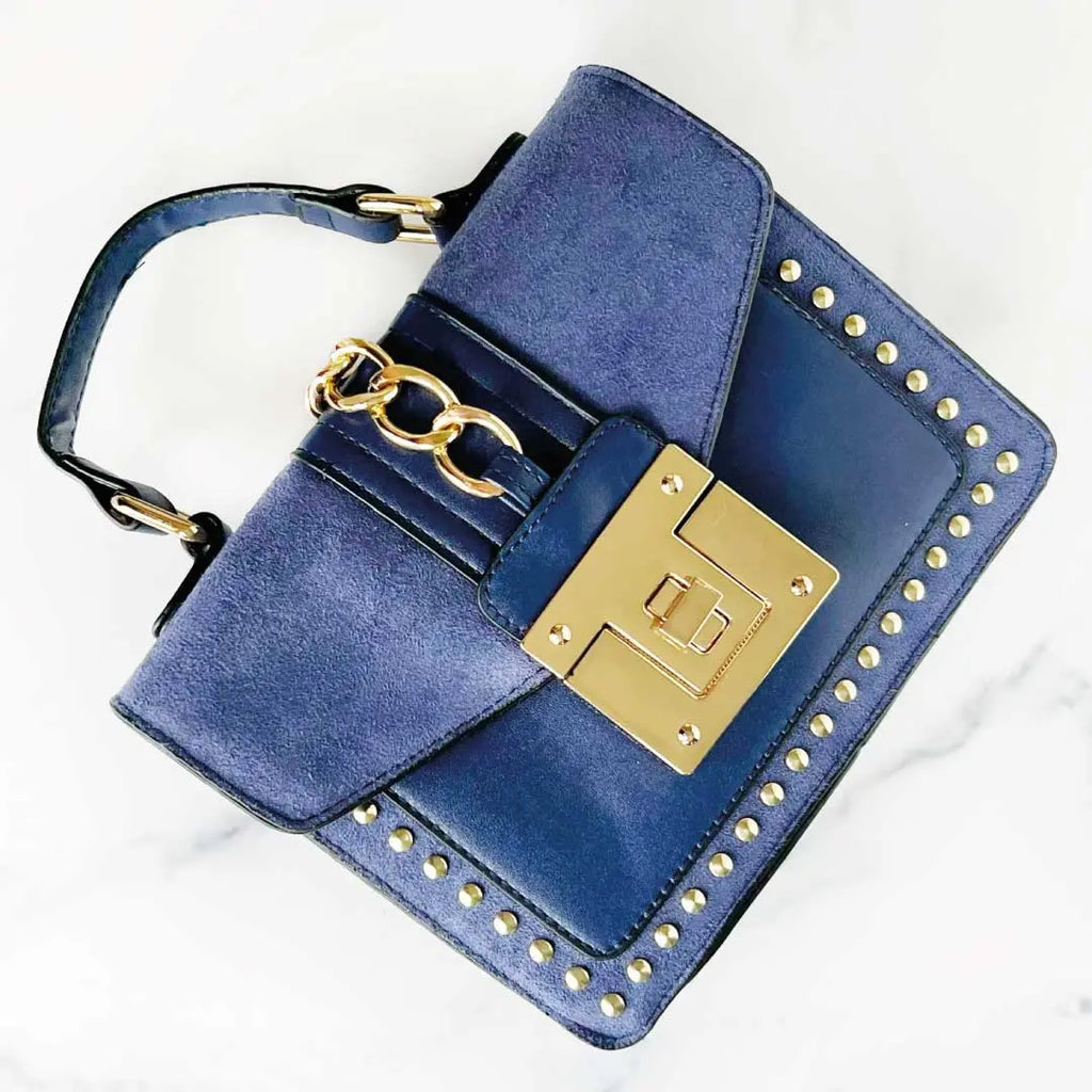 Fiona Shoulder Bag in blue with gold studs and chain detail, a stylish vegan leather shoulder bag.