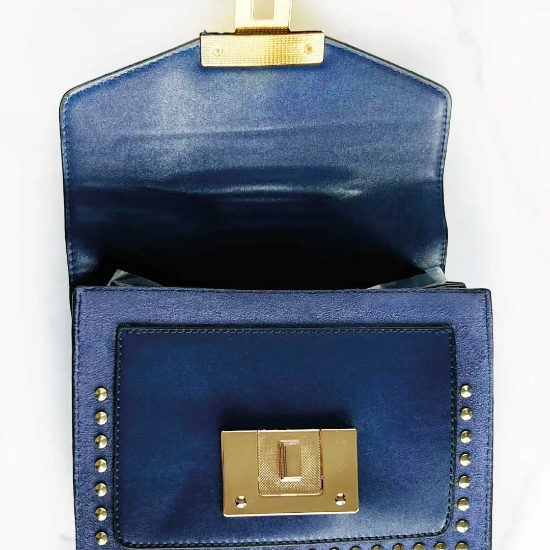 Interior view of Fiona Shoulder Bag showcasing gold stud detail and vegan leather shoulder bag design.