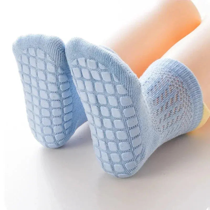 Three pairs of SHOPEZRA L.L.C. baby girl cotton non-slip socks in various colors, featuring breathable mesh and thin, comfortable design.