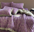 BohoBloom purple cotton bed set showcasing elegant purple and green floral design for a cozy bedroom oasis.