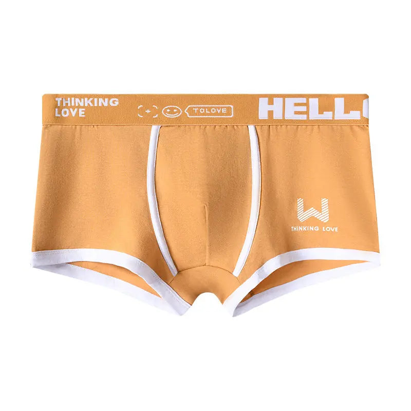 Dingxin men's breathable beige boxer briefs with middle waist, letter print, traceless design, comfortable fit, trendy youth underwear.