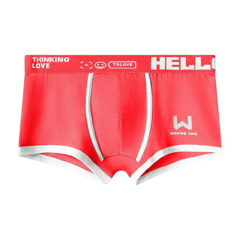 Dingxin men's breathable cotton boxers with middle waist, trendy letter design, in ginger yellow, comfortable fit, factory outlet product.