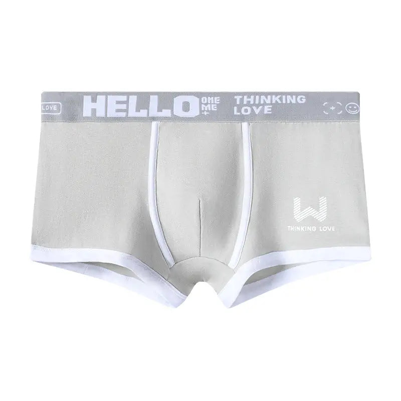 Yellow men's boxer briefs by Dingxin, breathable and comfortable with a traceless, trendy design, featuring a middle waist fit.