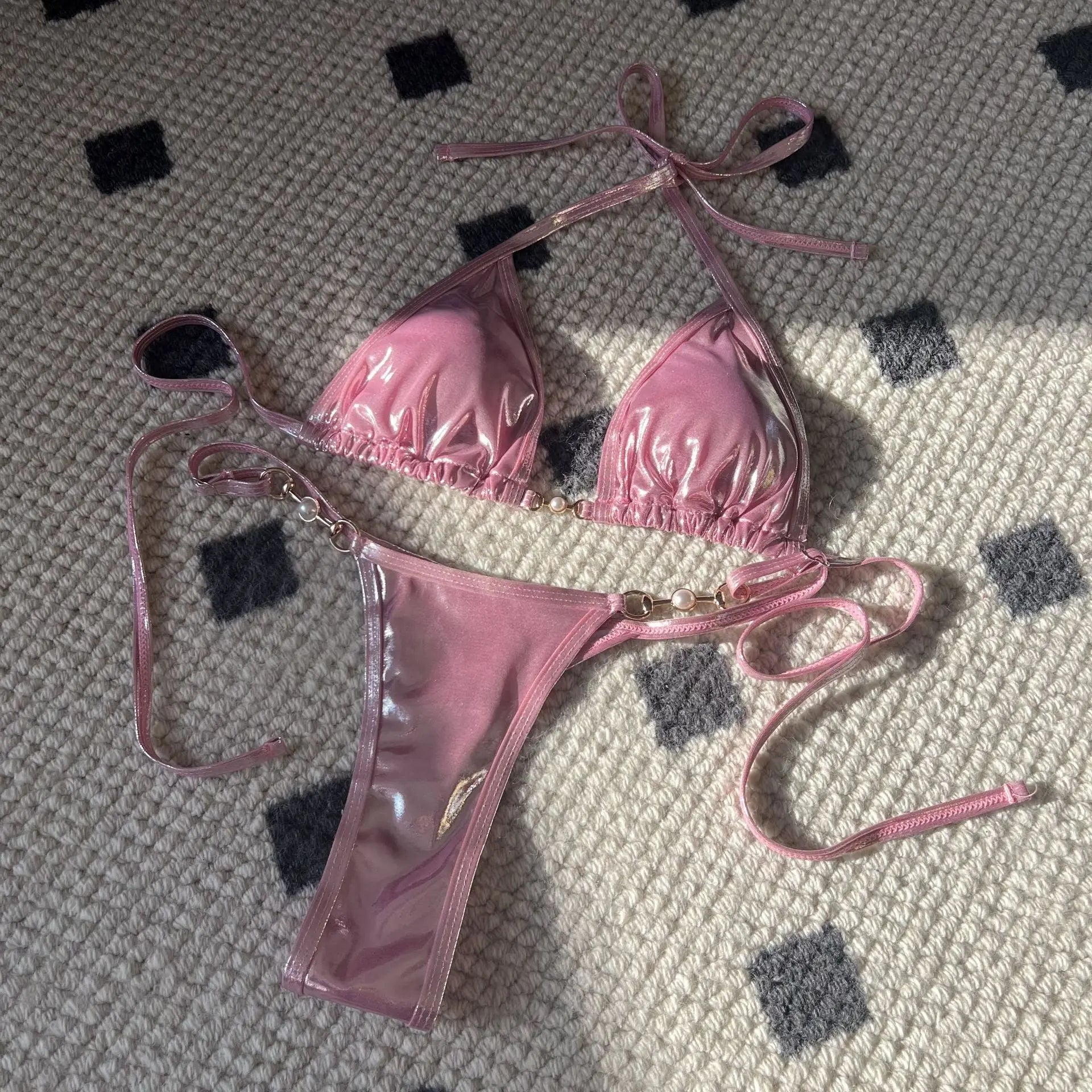Glossy pearl thong bikini swimsuit by Shopezra L.L.C., featuring a sexy, modern design in gold with European and American style.