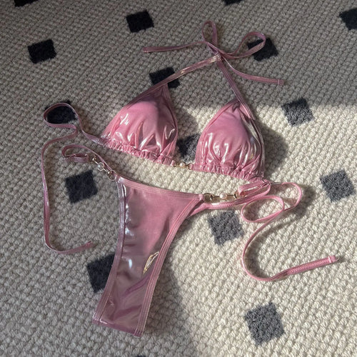 Glossy pearl thong bikini swimsuit by Shopezra L.L.C., featuring a sexy, modern design in gold with European and American style.