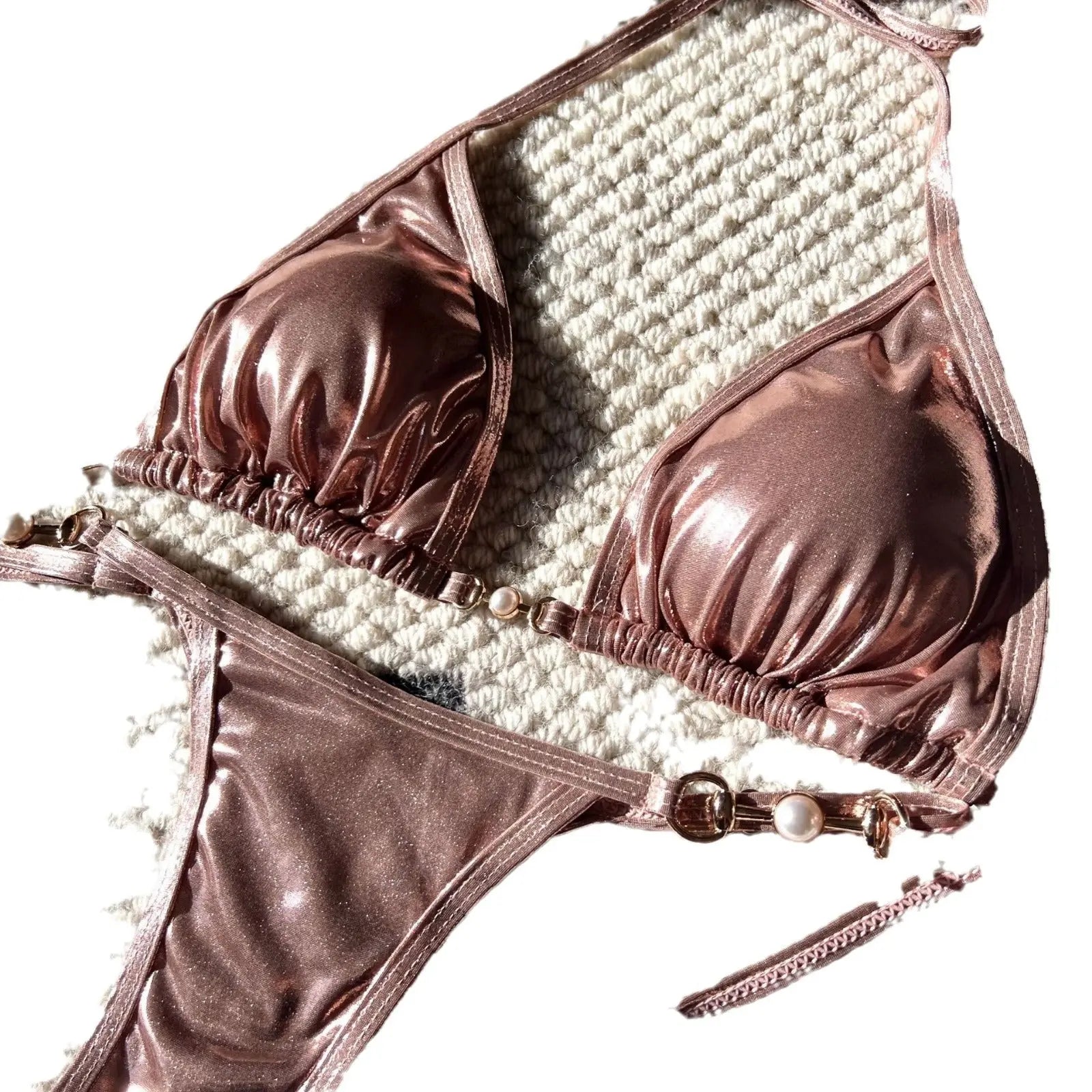 Gold shiny pearl thong bikini swimsuit by Shopezra L.L.C. featuring a sexy, glossy European and American design.