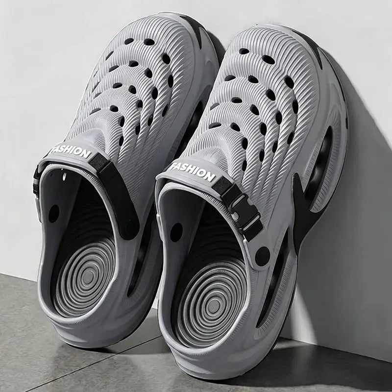 Gray men's fashion hollow-out sports sandals with thick soles, EVA soft sole, non-slip outdoor design, ideal for beach and summer activities.