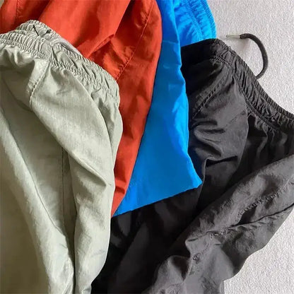Top quality luxury knee-length summer youth leisure sports nylon shorts loose men&