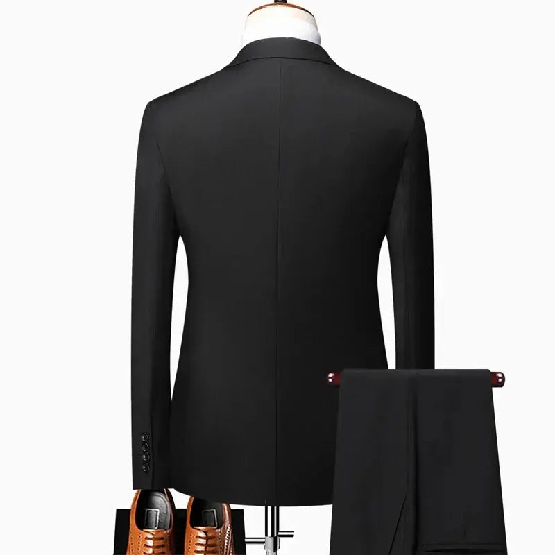 Gray men's formal suit by SHOPEZRA L.L.C. featuring a classic solid color design, ideal for business, weddings, or outdoor events.