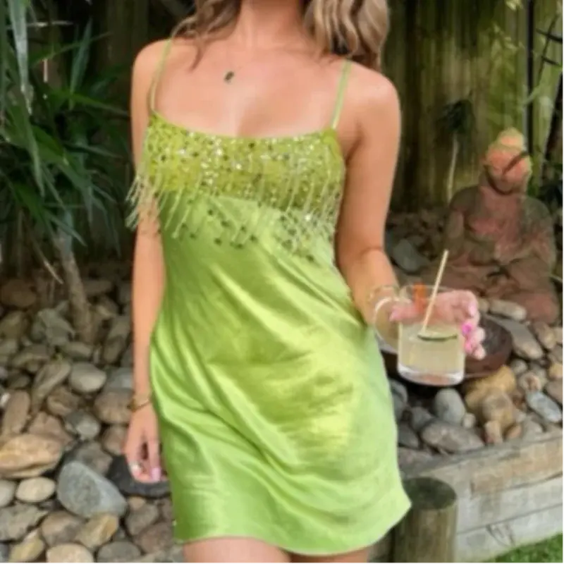 Elegant green satin mini dress with sequin tassels, low neckline, and stylish back zipper, perfect for beach parties and events.