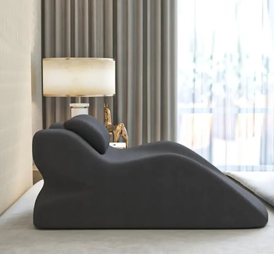 Supportive stomach sleeper pillow designed for comfort while sleeping or relaxing in a prone position.