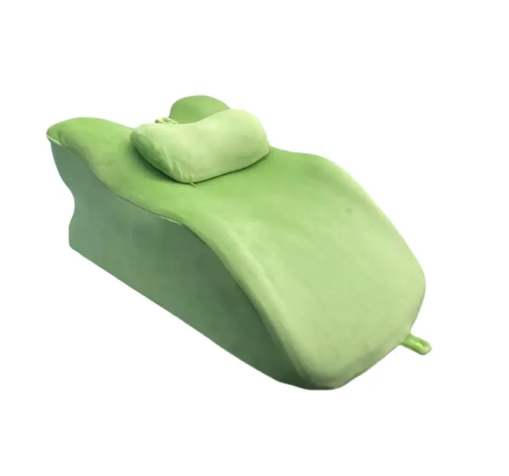 Supportive stomach sleeper pillow in green, designed for gentle neck and spine support for stomach sleepers.