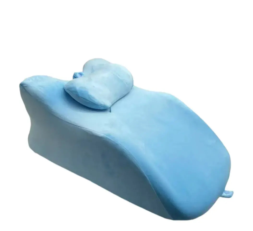 Green stomach sleeper pillow by SHOPEZRA L.L.C. with ergonomic design for comfortable side and stomach sleeping.
