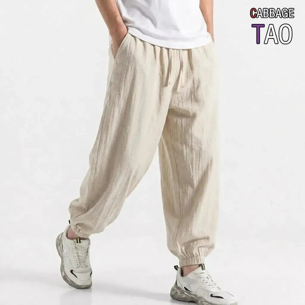 Green men's cotton linen harem trousers with drawstring, loose fit, casual streetwear style for gym, daily wear, and spring summer.