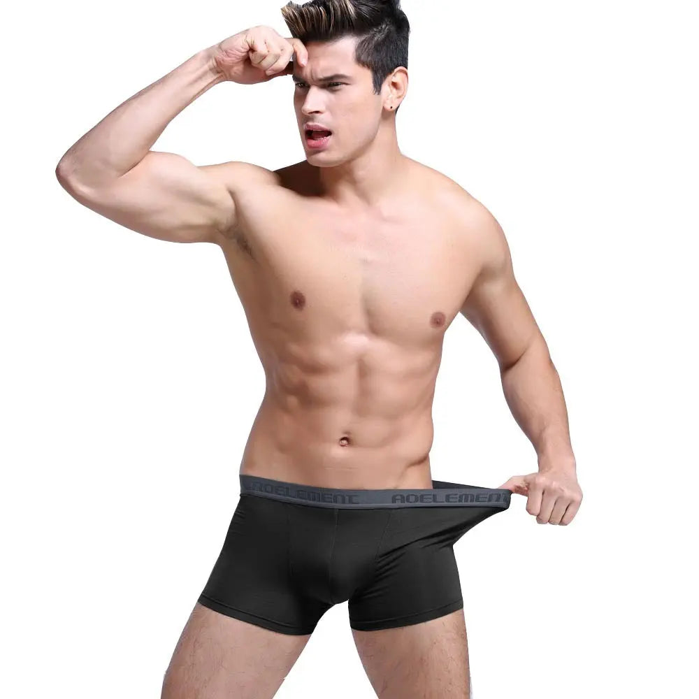 Grey men's U-convex mid-waist boxer underwear by SHOPEZRA L.L.C., breathable, sweat-absorbing, with a sexy, comfortable fit.