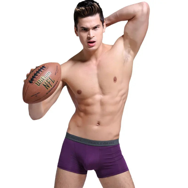 Grey men's U-convex boxer underwear by SHOPEZRA L.L.C., mid-waist design, breathable, sweat-absorbing, sexy and comfortable.