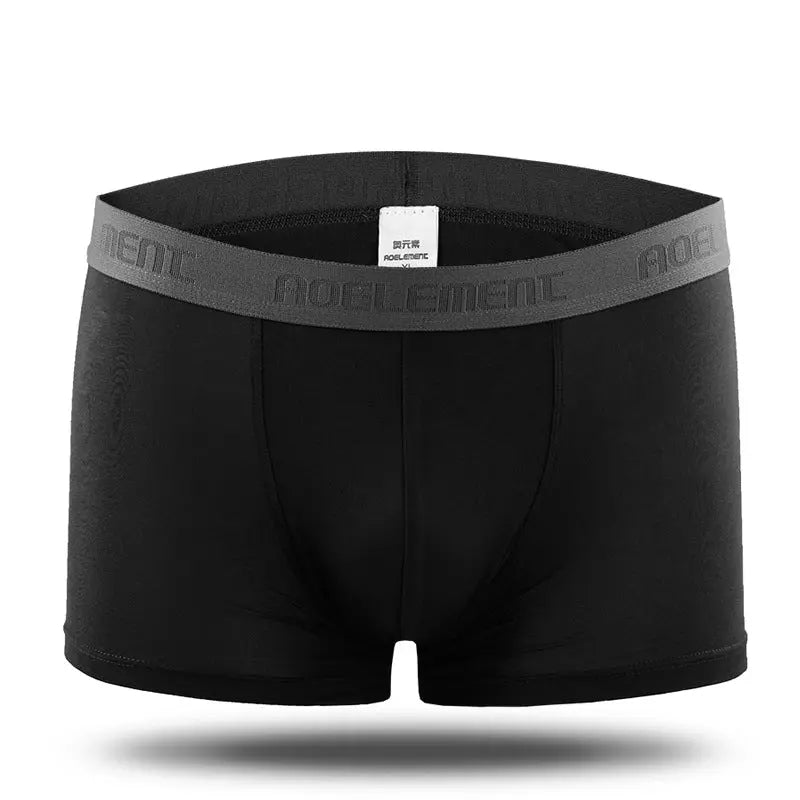 Grey men's U-convex mid-waist boxer underwear by SHOPEZRA L.L.C., featuring breathable, sweat-absorbing fabric and a sexy fit.