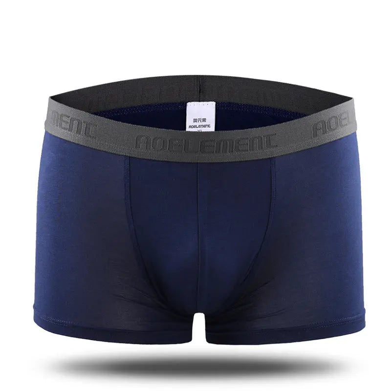 Grey men's U-convex mid-waist boxer underwear by SHOPEZRA L.L.C., breathable, sweat-absorbing fabric with a sexy fit.