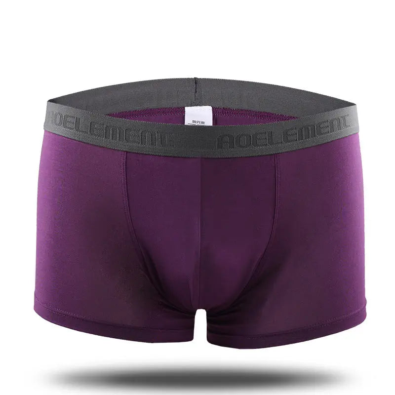 Grey men's U-convex mid-waist boxer underwear by SHOPEZRA L.L.C., breathable, sweat-absorbing, and sexy boxer brief design.