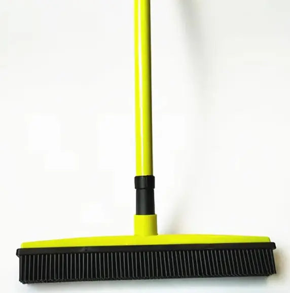 Pet hair removal broom designed for effective hair pickup from carpets and floors, featuring a washable mop head.