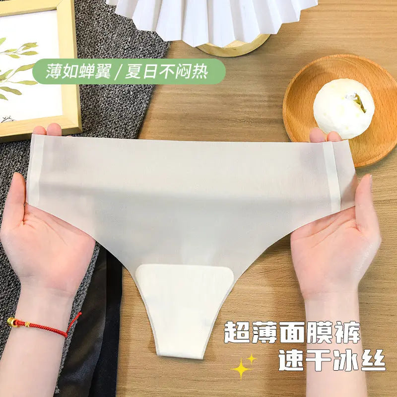 Shopezra L.L.C. women's ivory white seamless thong underwear made of pure cotton and ice silk for sports and fitness.