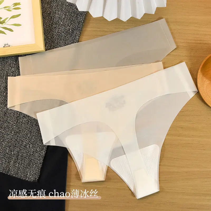 Shopezra L.L.C. women's ivory white seamless thong underwear, one-piece, breathable cotton and ice silk for sports and fitness.