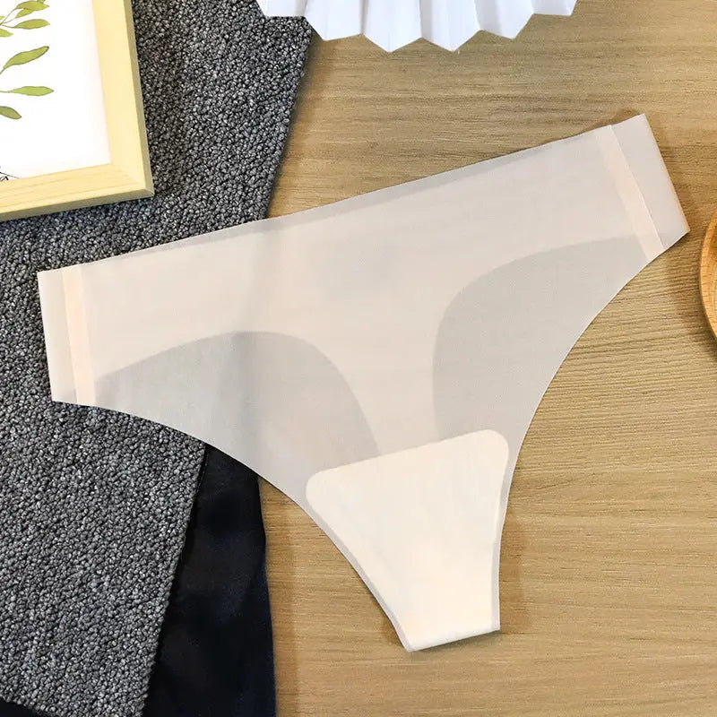 Shopezra L.L.C. women's ivory white seamless thong underwear made of pure cotton and ice silk, designed for sports and fitness.