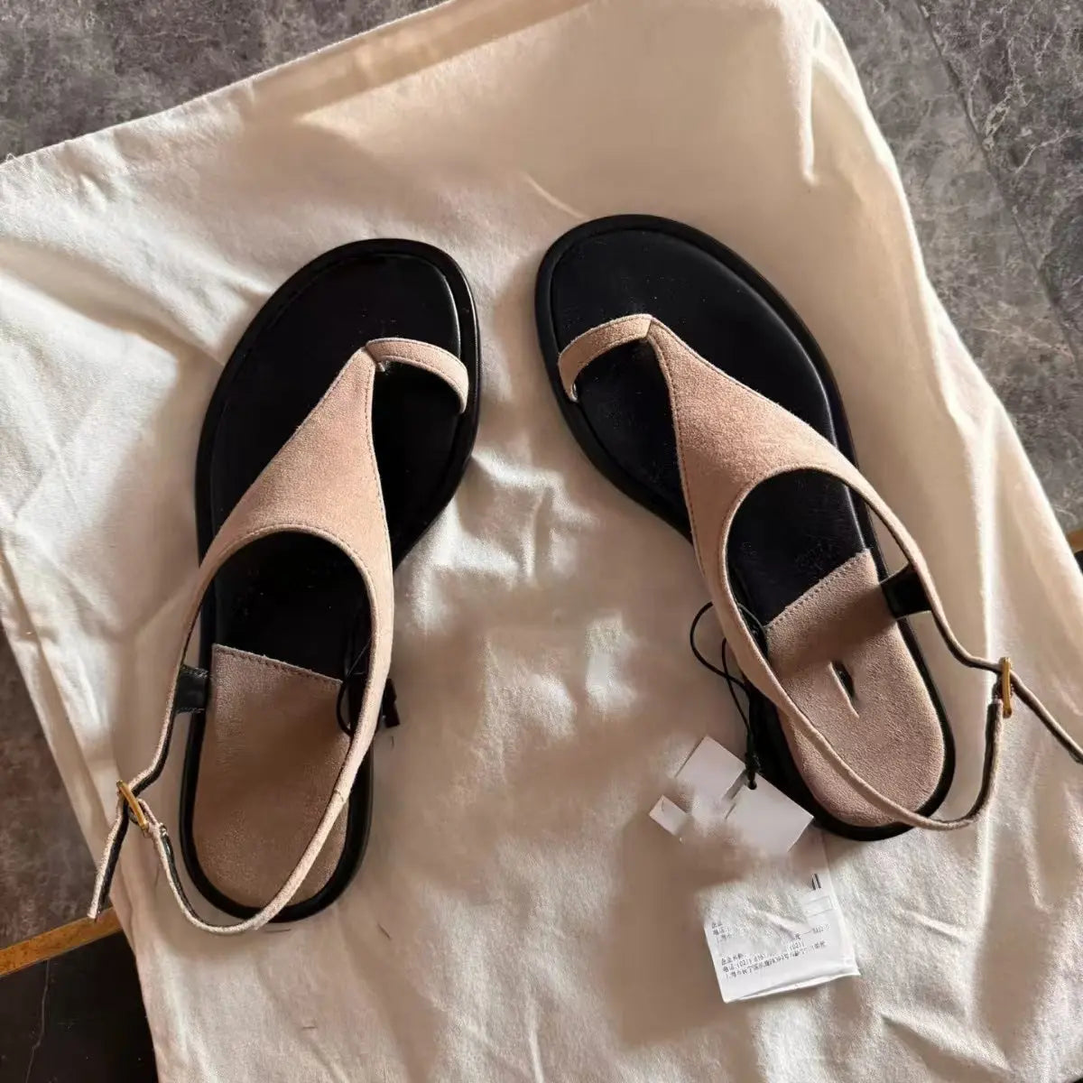 Shopezra L.L.C. leather thong sandals for women, khaki color, summer outdoor Roman style slippers with suede flat soles.