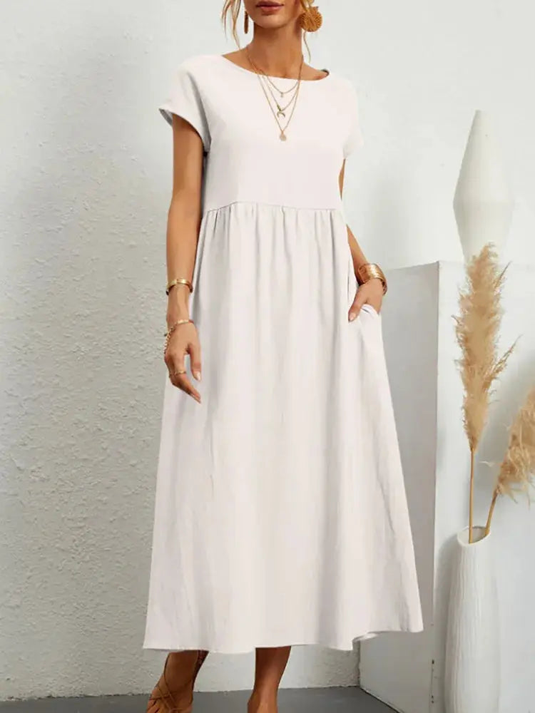 Cotton linen khaki midi sundress for women with short sleeves, loose A-line style, pockets, and oversized design