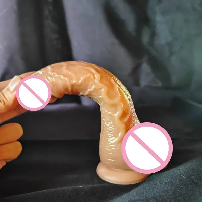 Realistic dildo with suction cup by SHOPEZRA L.L.C., featuring a large penis shape for anal and vaginal stimulation.