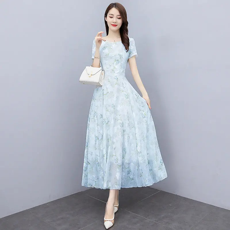 Light blue bohemian long chiffon dress for women, ankle-length seaside holiday beach dress, perfect for summer vacations.