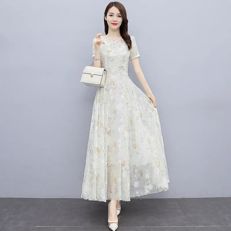Light blue bohemian long chiffon dress for women, ankle-length seaside holiday beach dress, perfect for summer vacations.