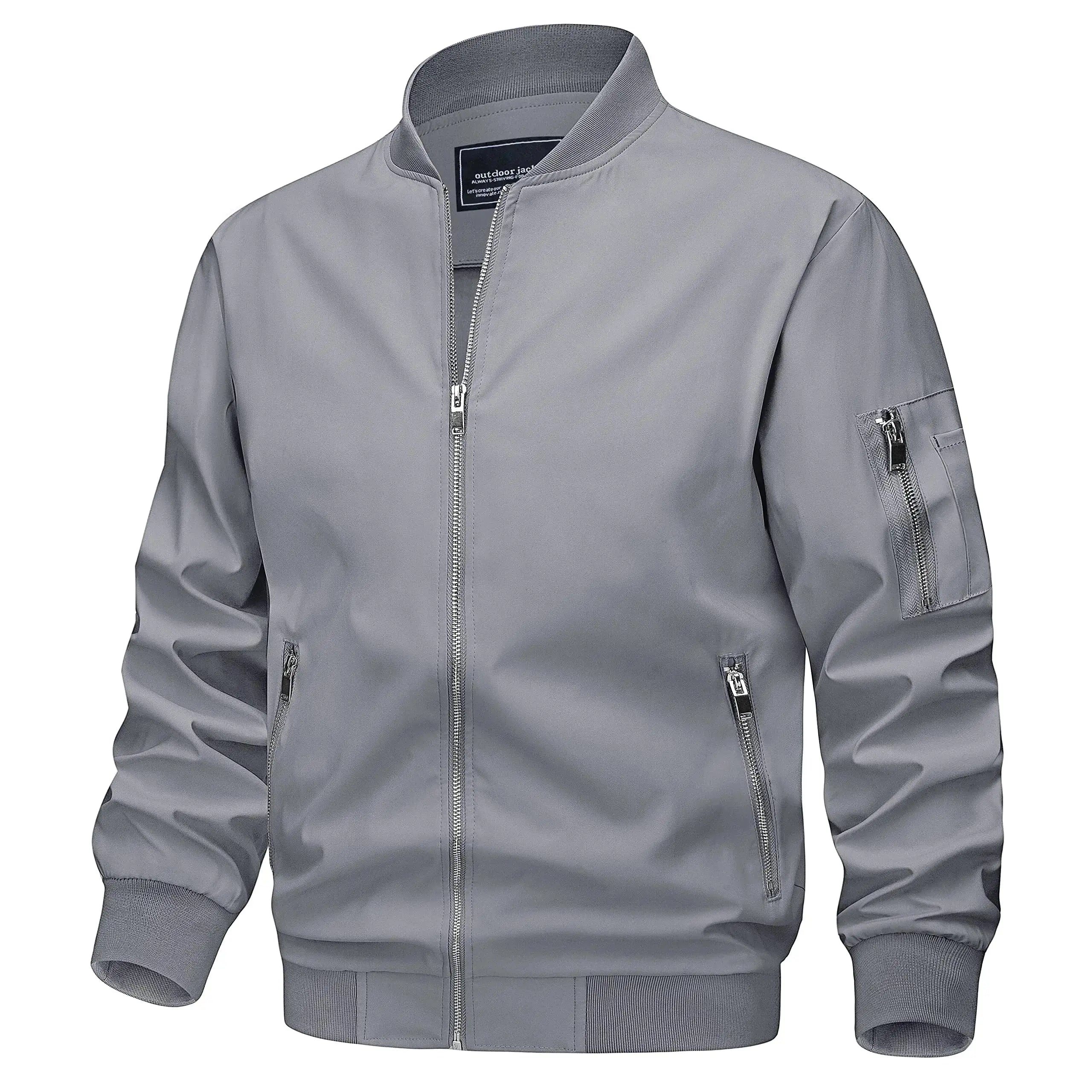 Light gray TACVASEN men's lightweight spring fall bomber jacket with zip pockets, casual windbreaker, and biker style outdoor coat.