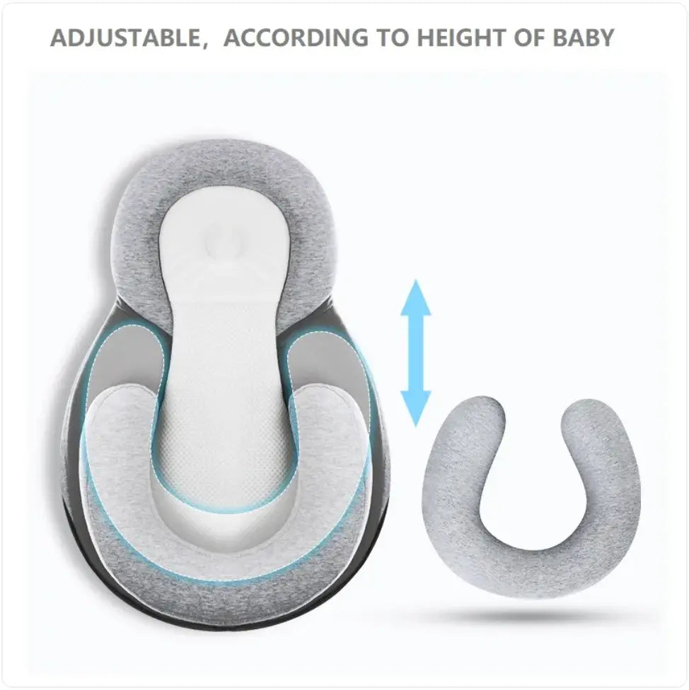 Light grey SHOPEZRA L.L.C. baby anti-spit up pillow with safety strap, designed to keep newborns comfortable during feedings.