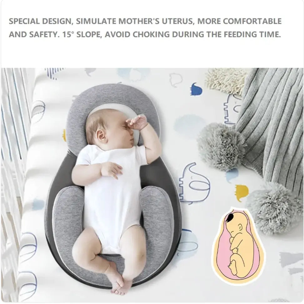 Light grey SHOPEZRA L.L.C. baby anti-spit up pillow with safety strap, designed to prevent spit-up and keep baby comfortable.