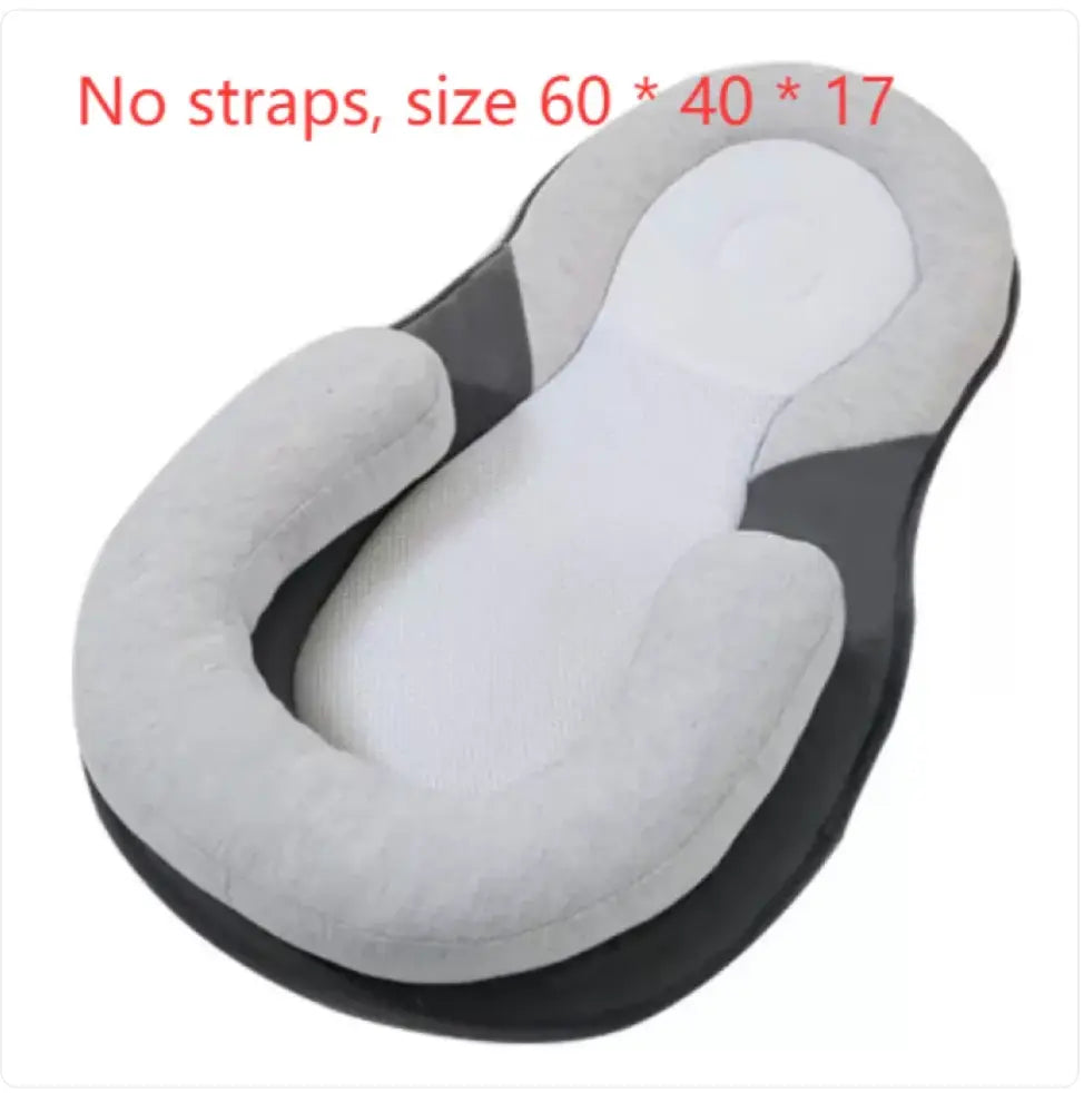 Light grey SHOPEZRA L.L.C. baby anti-spit up pillow with safety strap, designed to keep babies comfortable during feedings.
