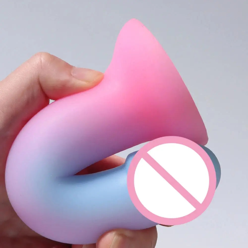 Cute soft luminous silicone dildo with realistic skin feel, suction cup base, designed for female masturbation and pleasure.