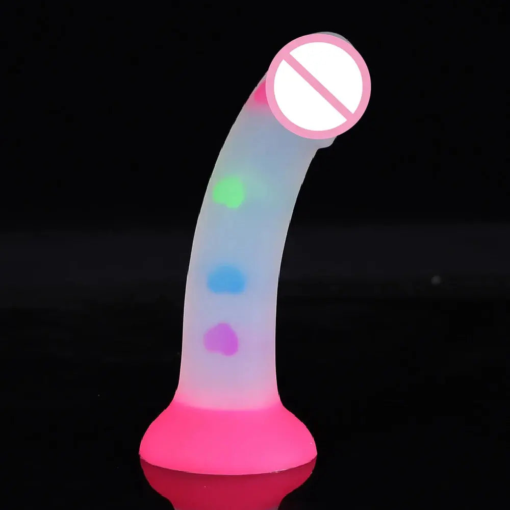 Cute soft luminous dildo female masturbator sex toy with realistic silicone skin and suction cup for easy use.