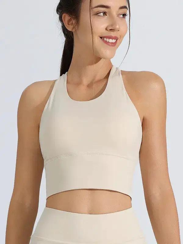 Shopezra L.L.C. women's shockproof sports underwear, high-strength running and yoga suit with fixed yoga bra vest in white.