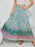 Marty Boho Maxi Skirt featuring a vibrant multicolor bohemian print, perfect for stylish beach strolls.