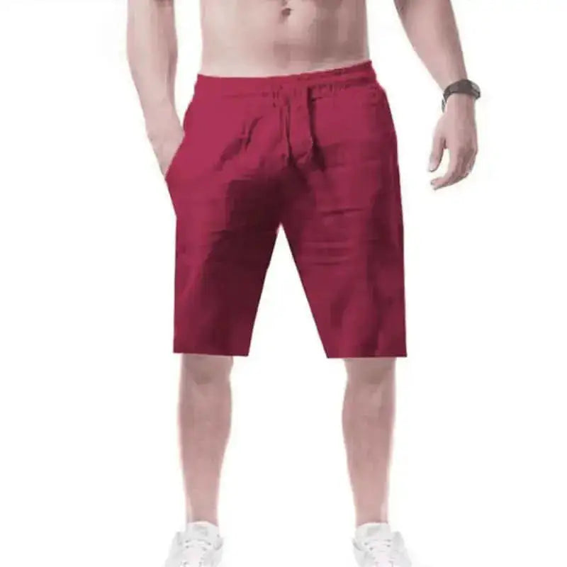 Men's breathable cotton shorts in solid color, shown in beige with side pockets, stylish summer streetwear by SHOPEZRA L.L.C.