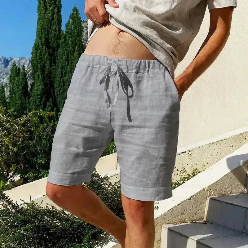Men's breathable cotton shorts in solid color, summer streetwear, available in sizes S to 3XL, shown in black with relaxed fit