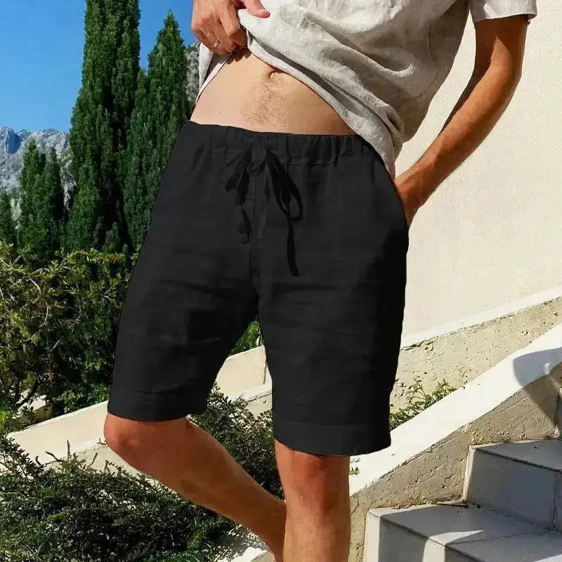 Men's breathable cotton shorts in solid color, summer streetwear style, available in size S to 3XL, shown in black.