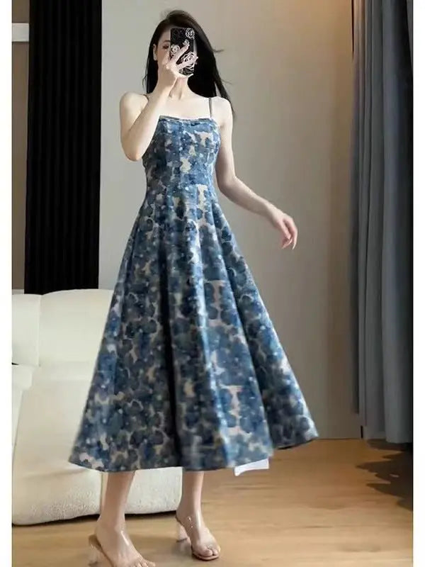 Elegant 2024 retro floral strap dress for women, mid-length summer beach dress with a fairy-inspired design and vibrant floral pattern.