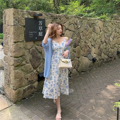 Summer women's floral dress by ShopeZra L.L.C., short, V-neck, strap style with French-inspired casual design.