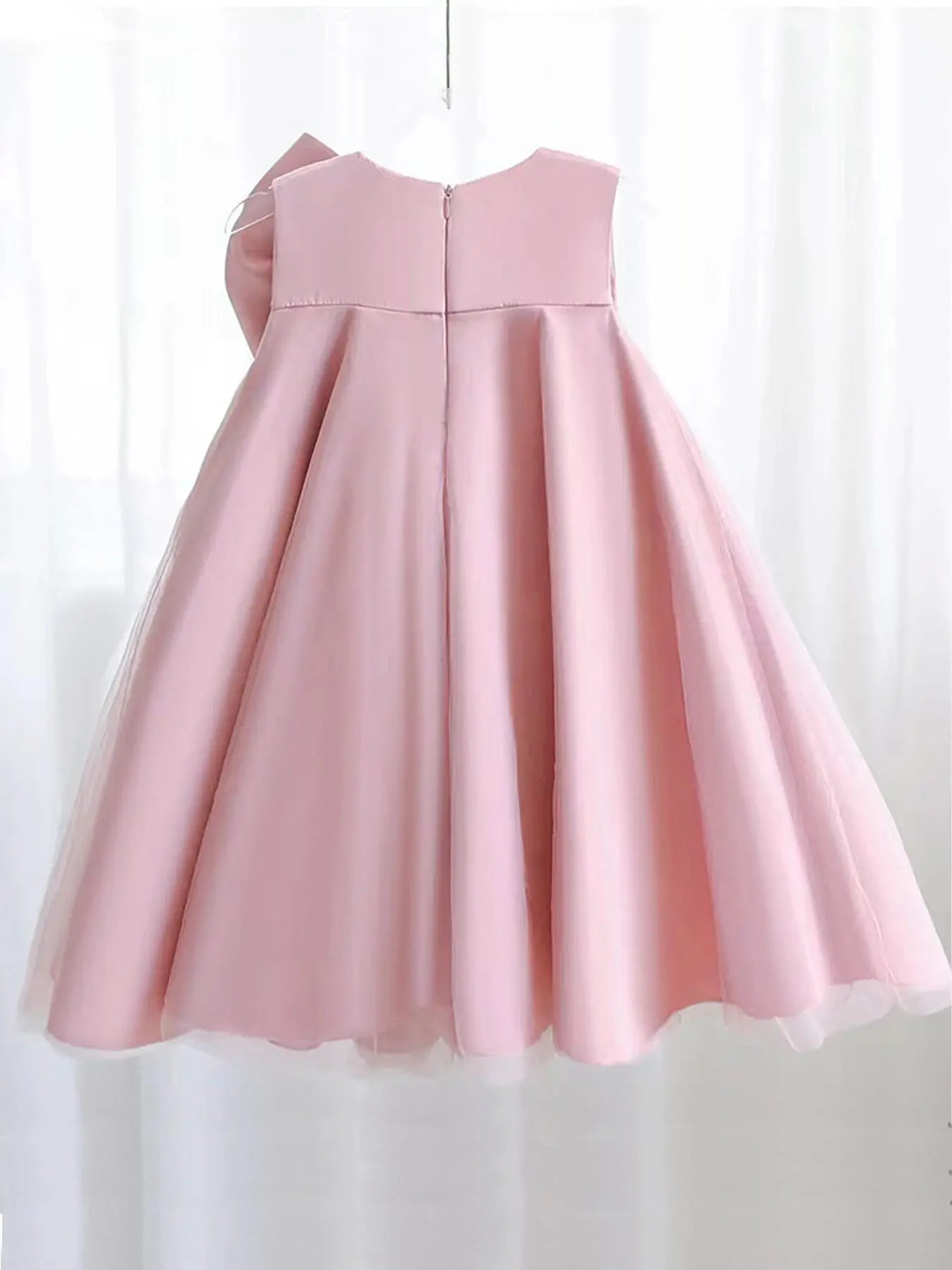 Pink big bow girl dress from SHOPEZRA L.L.C. for birthday parties, weddings, flower girl, and holy communion occasions.