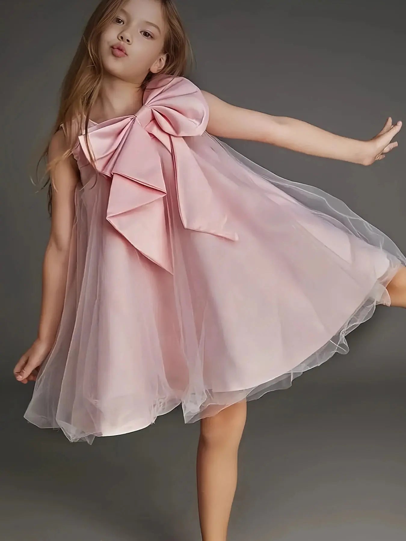 Pink big bow girl dress by SHOPEZRA L.L.C. for birthdays, weddings, and holy communions, featuring a cute, washing-friendly design.