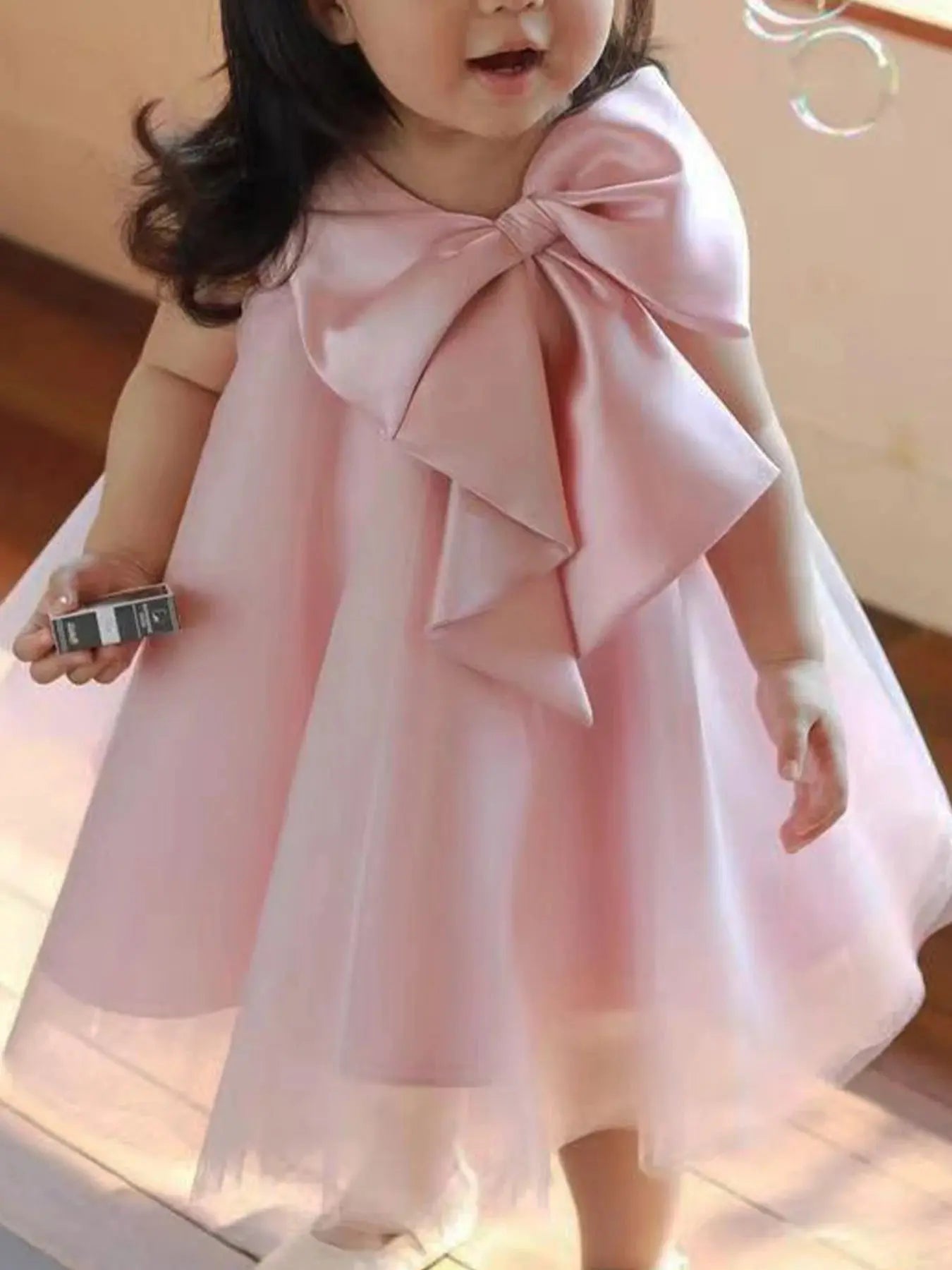 Pink big bow girl dress for birthdays, weddings, and holy communion, featuring a cute design and floral accents by SHOPEZRA L.L.C.