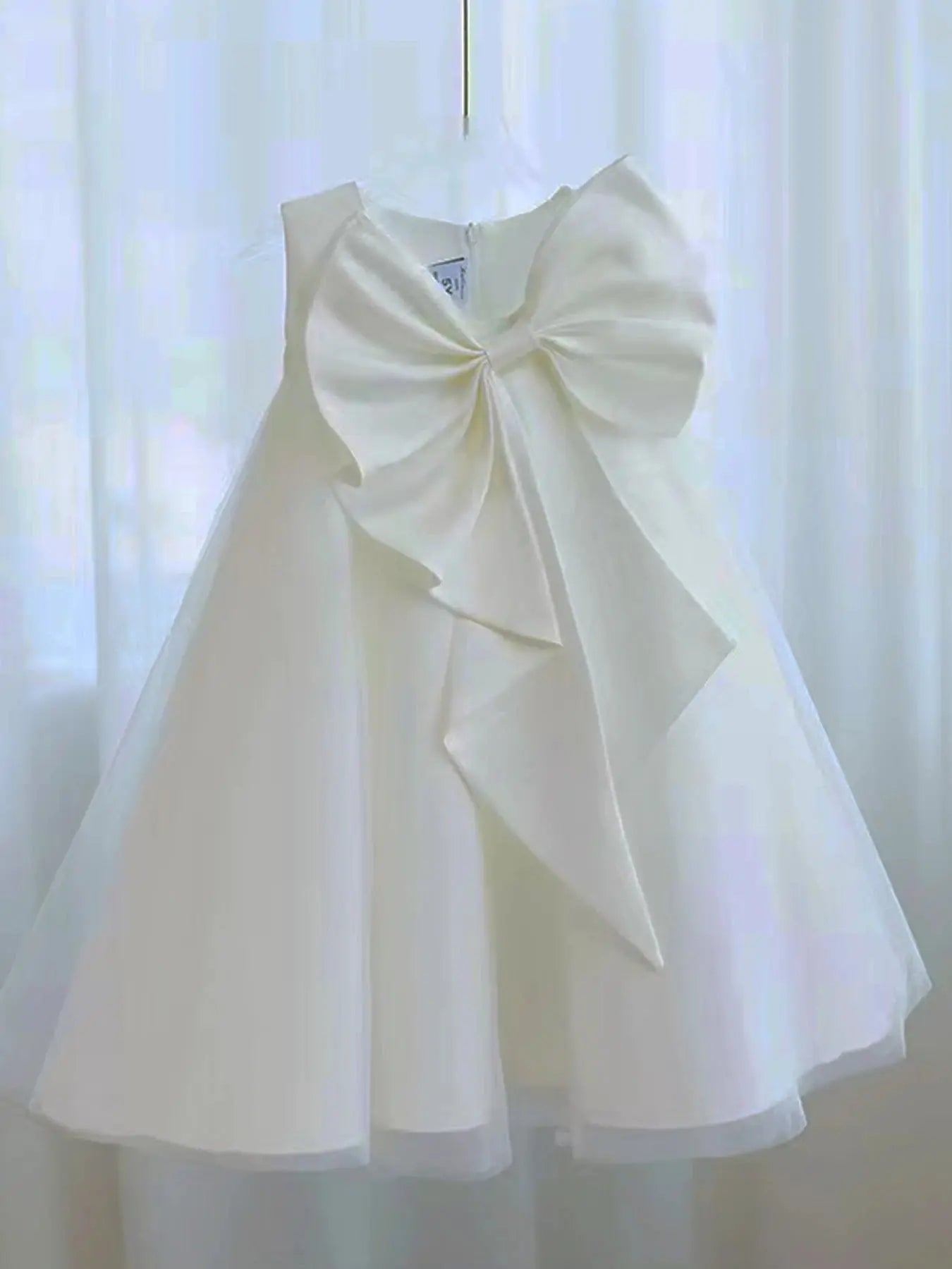 Pink big bow girl dress by SHOPEZRA L.L.C. for birthdays, weddings, flower girl, and holy communion with a cute, elegant style.